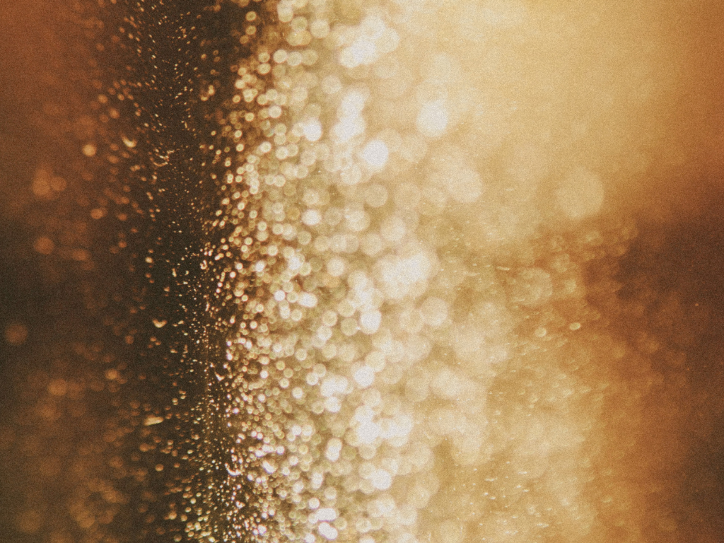 Goldener, glitzernder Hintergrund
